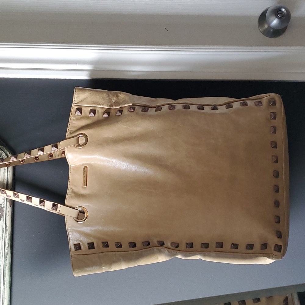 Rebecca minkoff leather handbag with metal wear. EUC